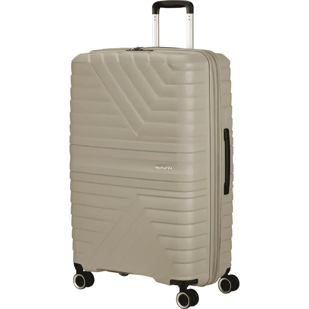 Assortiment American Tourister Flytwist Spinner koffers in Sandstone, Stormblue, Botanic Green en Shadow Black